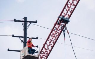How to Avoid Power Line Hazards When Operating a Crane